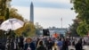 Journalists from all over the world wait for the result of the U.S. presidential elections on Black Lives Matter Plaza in front of the White House in Washington, D.C., Nov. 6, 2020.