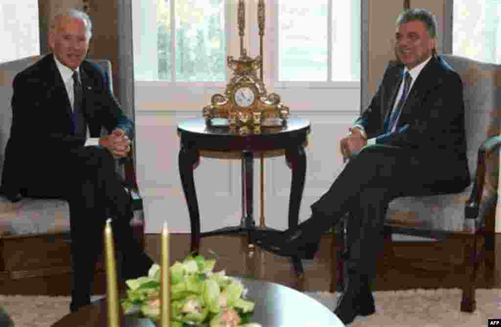 U. S. Vice President Joe Biden, left, and Turkish President Abdullah Gul are seen during their meeting in Ankara, Turkey, Friday, Dec. 2, 2011. Biden called on Turkey to impose new sanctions against Iran, while praising Ankara for its role in pressuring S