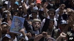 Anti-government protesters chant slogans during a demonstration demanding the resignation of Yemeni President Ali Abdullah Saleh, in Sana'a, Yemen, March 5, 2011