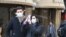 Tourists with protective mask visit Florence on February 25, 2020 as Tuscany reported its first two cases of COVID-19.