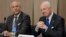 UN special envoy for Syria envoy Staffan de Mistura, right, and his deputy Ramzy Ezzeldin Ramzy attend a meeting with the Syrian government delegation during Syria peace talks at the United Nations office in Geneva, Switzerland, April 22, 2016.