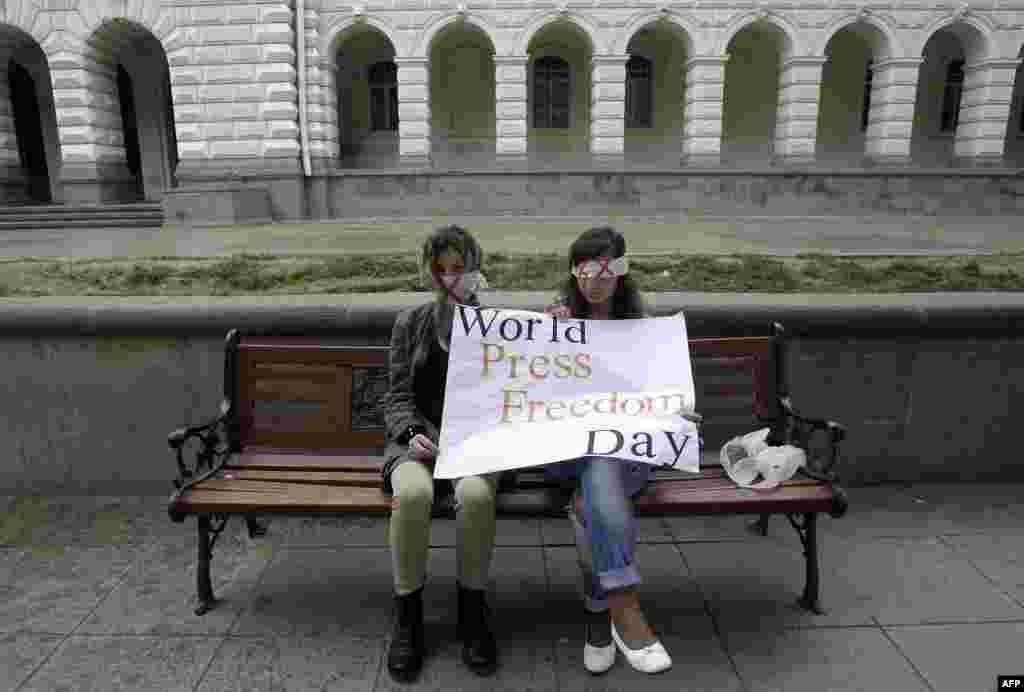 People take part in a flashmob to mark World Press Freedom Day in Tbilisi, May 3, 2012.