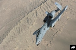 FILE - A U.S. Air Force Air Force A-10 Thunderbolt II in-flight over Afghanistan, Oct. 2008. (Photo by Staff Sgt. Aaron Allmon)