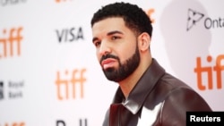 Rapper Drake arrives on the red carpet for the film "The Carter Effect" at the Toronto International Film Festival (TIFF), in Toronto, Canada, Sept. 9, 2017. 