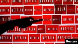 FILE - The Netflix logo is shown in this illustration photograph in Encinitas, California, Oct. 14, 2014.