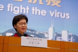 Hong Kong's Chief Executive Carrie Lam holds a press conference as her government announces strict new anti-coronavirus controls in Hong Kong, Jan. 5, 2022.
