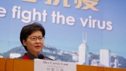 Hong Kong's Chief Executive Carrie Lam holds a press conference as her government announces strict new anti-coronavirus controls in Hong Kong, Jan. 5, 2022.
