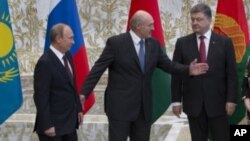 烏克蘭總統波羅申科(右)與俄羅斯總統普京(左)