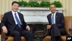 President Barack Obama with Chinese President Xi Jinping (File photo).