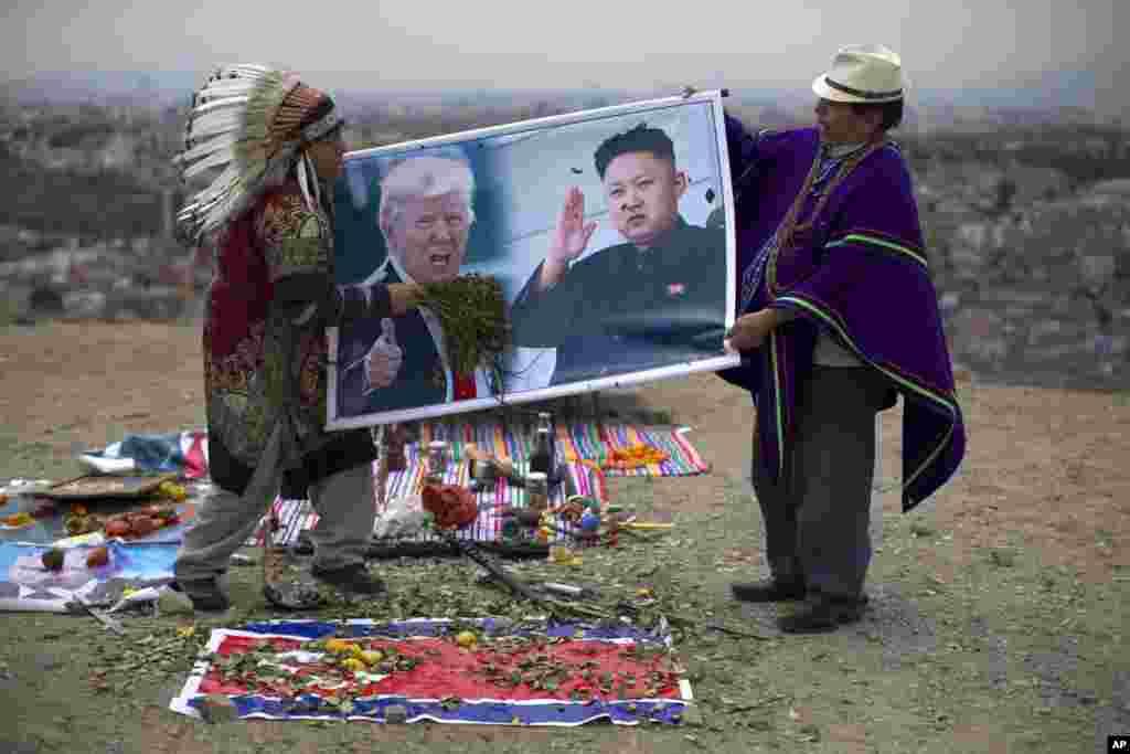 Shamans perform the ritual for peace between the U.S. and North Korea on Morro Solar in Lima, Peru, June 12, 2017.