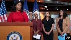 From left, Rep. Ayanna Pressley, D-Mass., Rep. llhan Omar, D-Minn., Rep. Alexandria Ocasio-Cortez, D-N.Y., and Rep. Rashida Tlaib, D-Mich., respond to remarks by President Donald Trump after his call for the four Democratic congresswomen to go back to the