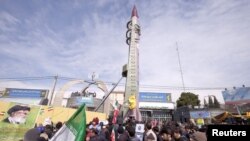 FILE - The Iranian-made Emad missile is displayed in Tehran, Feb. 11, 2016.