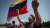 A woman chants anti-government slogans in a walkout against President Nicolas Maduro, in Maracaibo, Venezuela, Jan. 30, 2019. 