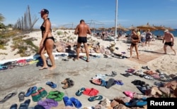 A Russian tourist is pictured at the beachside of the Steigenberger Kantaoui Bay Hotel, in Sousse, Tunisia, Sept. 29, 2017.