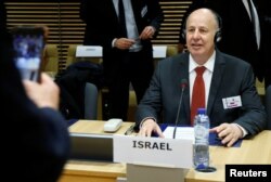 FILE - Israeli Minister of Regional Cooperation Tzachi Hanegbi attends a session of the International Donor Group for Palestine at the EU Commission headquarters in Brussels, Jan. 31, 2018.