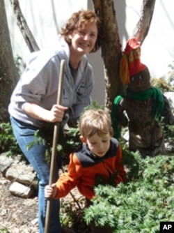 Alexandra Patz gardens with her son, Douglas.