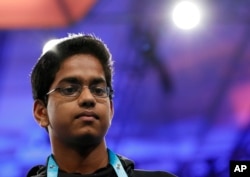 Shourav Dasari, 14, from Spring, Texas, pauses before spelling his word during the 90th Scripps National Spelling Bee, Thursday, June 1, 2017, in Oxon Hill, Md. (AP Photo/Alex Brandon)