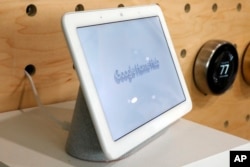 A Google Home Hub is displayed in New York, Tuesday, Oct. 9, 2018. (AP Photo/Richard Drew)