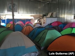 Temporary tents for about 130 Central Americans, mostly women and children, who arrived at the U.S. border with Mexico.
