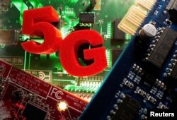 3d printed objects representing 5G are put on a motherboard in this picture illustration taken April 24, 2020. (REUTERS/Dado Ruvic /Illustration)