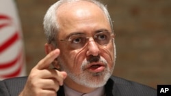 FILE - Iranian Foreign Minister Mohammad Javad Zarif speaks to the media after closed-door nuclear talks on Iran in Vienna, Austria. 