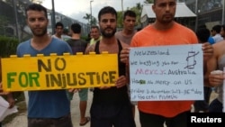 Asylum seekers protest on Manus Island, Papua New Guinea, in this picture taken from social media, Nov. 3, 2017