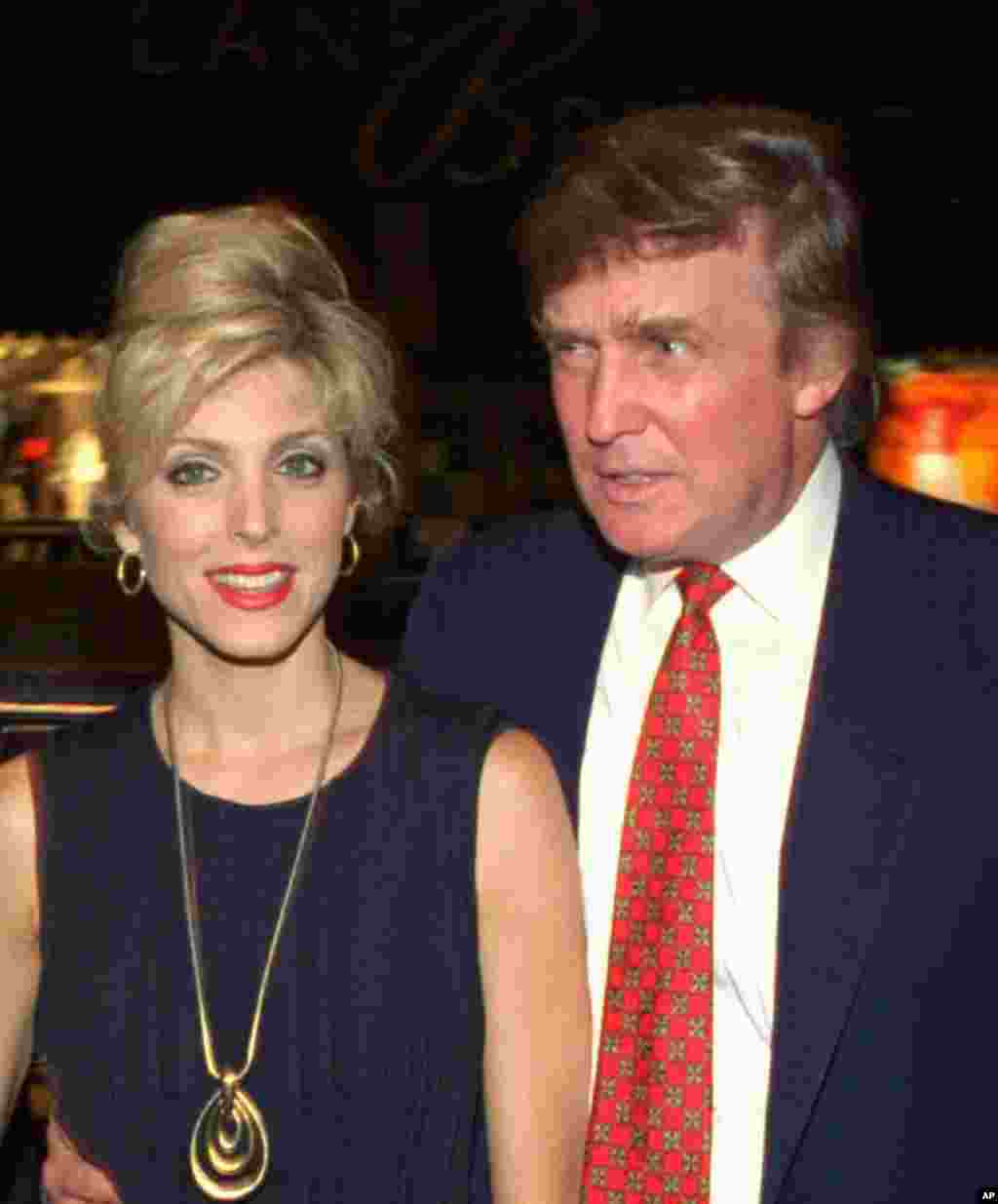 Donald Trump and wife, Marla Maples, are shown in this Aug. 23, 1994 photo. (AP Photo/John Bazemore)