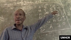 Koat Reath is shown in the classroom where he teaches young refugees from South Sudan at the Jewi refugee camp in Gambella, Ethiopia. (Photo: UNHCR)