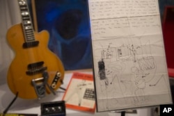 A letter from one of Pink Floyd's original members Syd Barrett to his girlfriend Jenny Spires, is photographed on display at the V&A museum in west London.