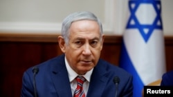 Israeli Prime Minister Benjamin Netanyahu attends the weekly cabinet meeting at the prime minister's office in Jerusalem, June 17, 2018.