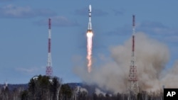 A Russian Soyuz 2.1a rocket carrying Lomonosov, Aist-2D and SamSat-218 satellites leaves a trail of smoke as it lifts off from the new Vostochny cosmodrome, April 28, 2016.