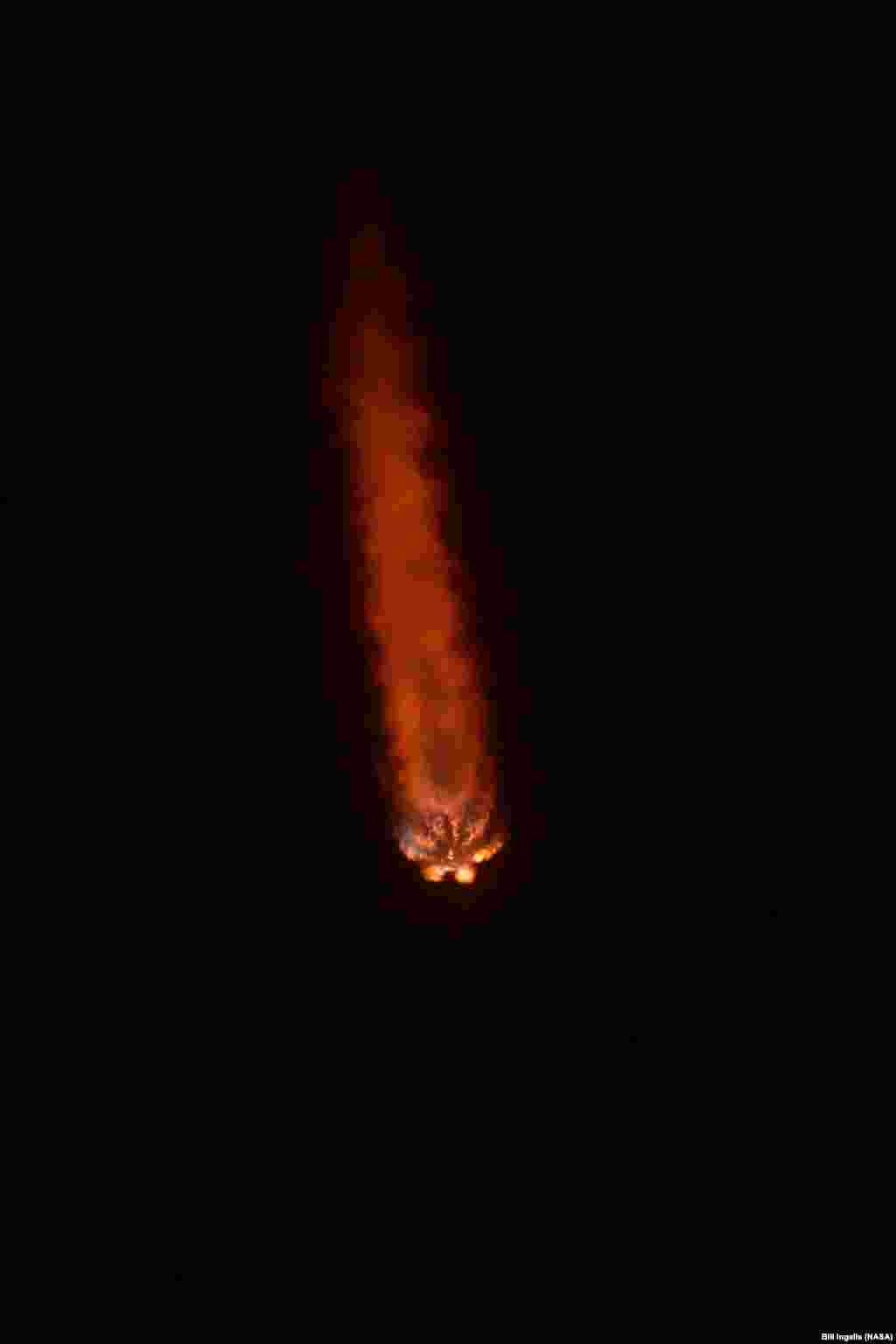 The SpaceX Falcon 9 rocket launches with the Double Asteroid Redirection Test, or DART, spacecraft onboard, from Space Launch Complex 4E at Vandenberg Space Force Base in California.