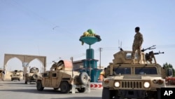 Des forces de sécurité afghane dans la ville de Ghazni, à l'ouest de Kaboul, en Afghanistan, le 12 août 2018