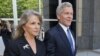 Former Virginia Gov. Bob McDonnell, right, and his wife Maureen, center, leave Federal court after a motions hearing in Richmond, Va., May 19, 2014. 