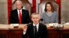 NATO Secretary General Jens Stoltenberg, with U.S. Vice President Mike Pence and U.S. House Speaker Nancy Pelosi in the background, addresses a joint session of Congress, on Capitol Hill in Washington, April 3, 2019.