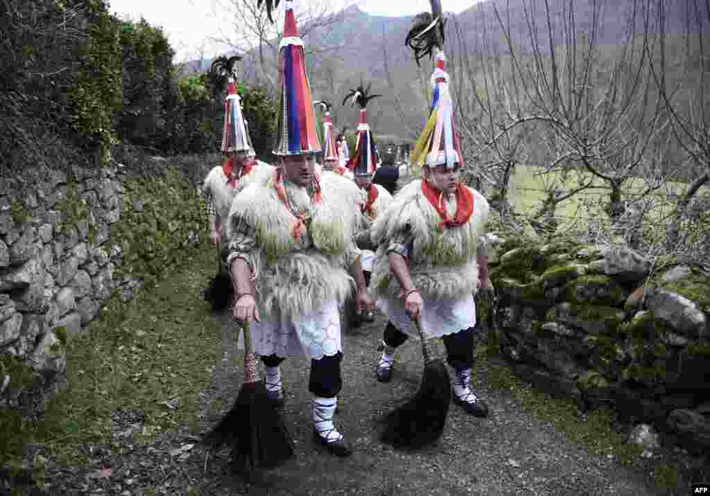 Bellringers, known as &quot;Joaldunak&quot; in Basque language march with big cowbells hanging on their back during the ancient carnival of Ituren, in the northern Spanish Navarra province.