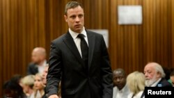 FILE - South African Olympic and Paralympic track star Oscar Pistorius attended his sentencing at the North Gauteng High Court in Pretoria, October 21, 2014.