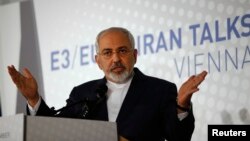 FILE - Iranian Foreign Minister Javad Zarif addresses a news conference after a meeting in Vienna.