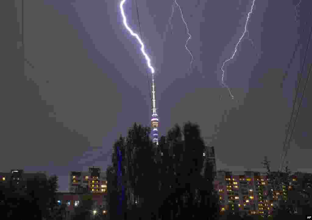 Lightning is seen in the sky over the Ostankino TV tower during a storm in Moscow, Russia, July 18, 2016.