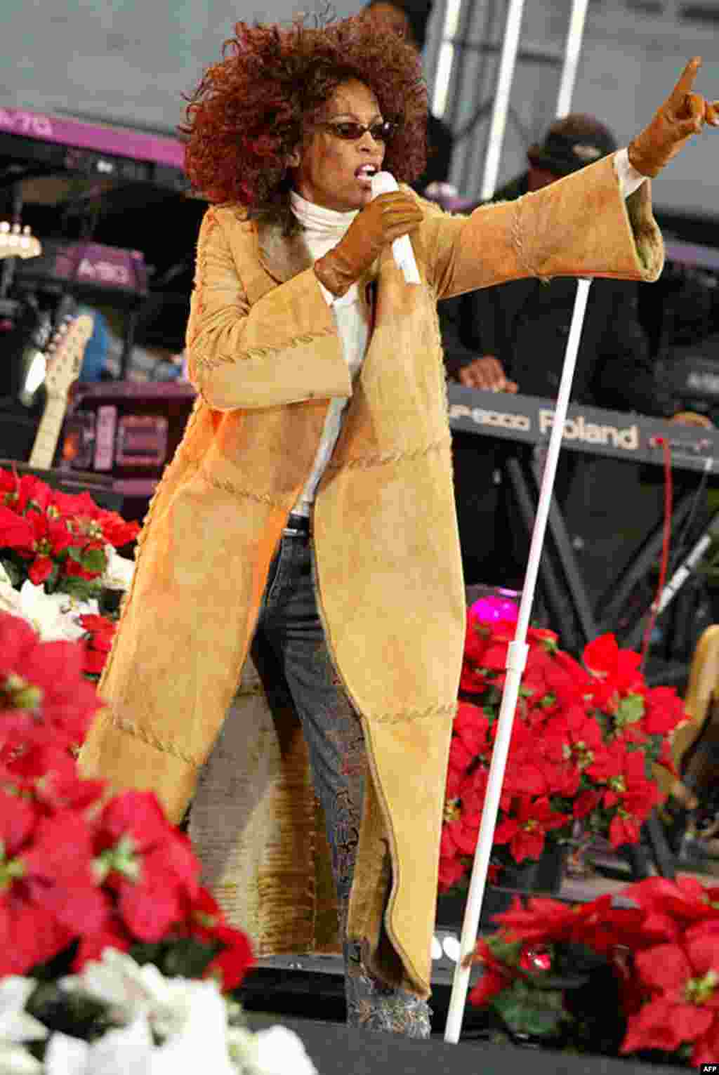 Whitney Houston performing songs from her new album "Just Whitney" for "Good Morning America" in New York, Sunday, Dec. 8, 2002. (AP)