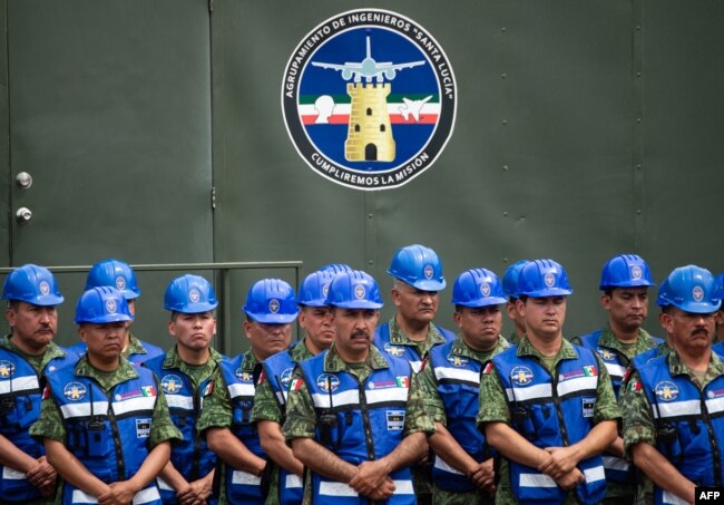 Military engineers are seen during the official event to mark the beginning of the construction of a new international airport, at the Santa Lucia Air Force Base in Zumpango near Mexico City, April 29, 2019.