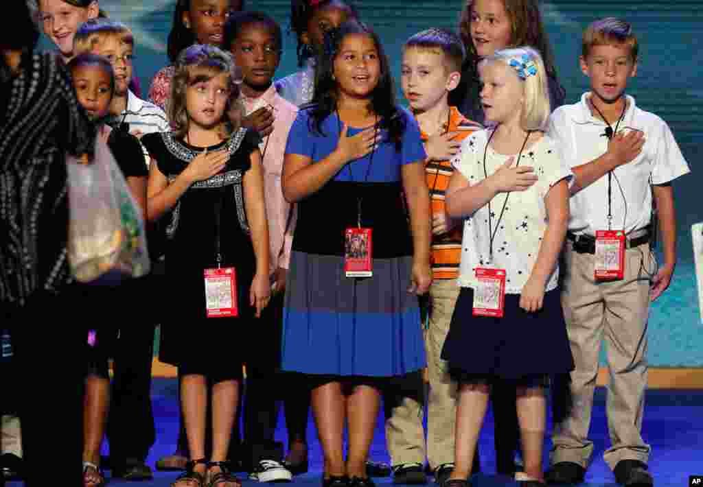 A group of third grade students rehearse saying the Pledge of Allegiance ahead of the first day of the convention in Time Warner Cable Arena, September 4, 2012.