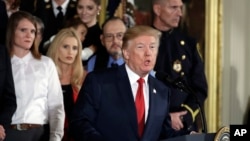 President Donald Trump speaks during an event declaring the opioid crisis in the U.S. a national public health emergency, in the East Room of the White House, Oct. 26, 2017, in Washington.