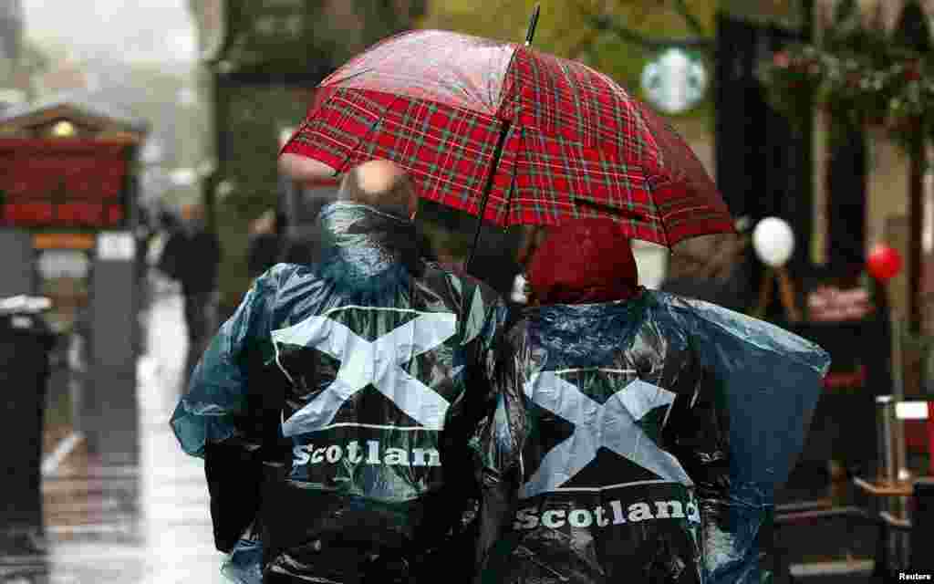 Tourists make their way along the Royal Mile in Edinburgh, Scotland. Britain will go to the polls in a national election on May 7.