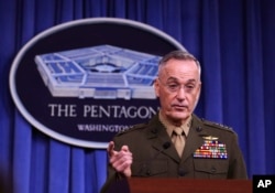 FILE - Joint Chiefs Chairman Gen. Joseph Dunford speaks to reporters at the Pentagon, Oct. 23, 2017.