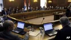 Members of the Serbian government attend a session in Belgrade, Serbia, April 22, 2013. 