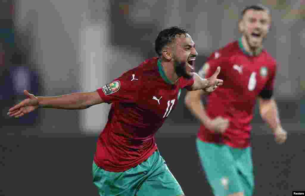 Morocco&#39;s Sofiane Boufal celebrates scoring their first goal.