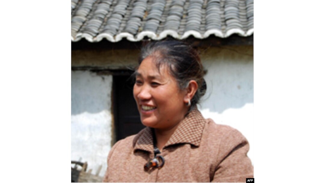 岳家邻居罗女士
