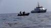 Indonesia Plane Crash Search Finds Remains, Debris At Sea