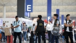 Hong Kong : retour à un calme précaire à l'aéroport